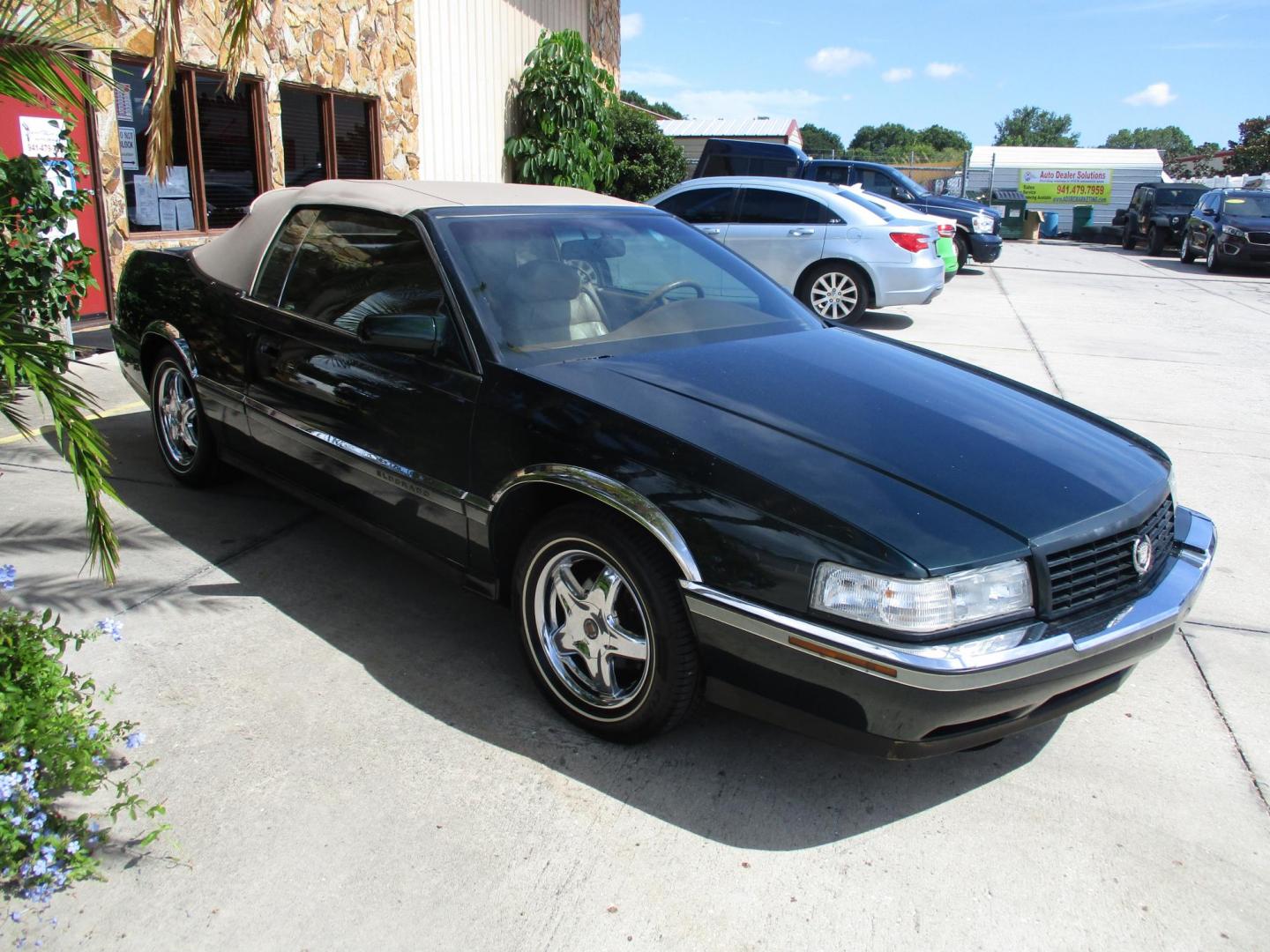 1994 GREEN Cadillac Eldorado Touring Coupe (1G6ET1297RU) with an 4.6L V8 DOHC 32V engine, 4-Speed Automatic Overdrive transmission, located at 4724 53rd Ave East, Suite 1, Bradenton, FL, 34203, (941) 803-7117, 27.445360, -82.501678 - **AUTO DEALER SOLUTIONS**4724 53rd Ave ESuite 1Bradenton, Fl 34203941-803-71171994 CADILLAC ELDORADO TOURING COUPE CONVERTIBLE4.6L V8 DOHC 32V1G6ET1297RU603373MILEAGE: 96,257GREENCOACH BUILDER CUSTOM CONVERTIBLE TOPVOGUE WHEELSNEW TIRESTRADES WELCOMEFINANCE OPTIONS AVAILABLE:^First Time Buyer Progra - Photo#6