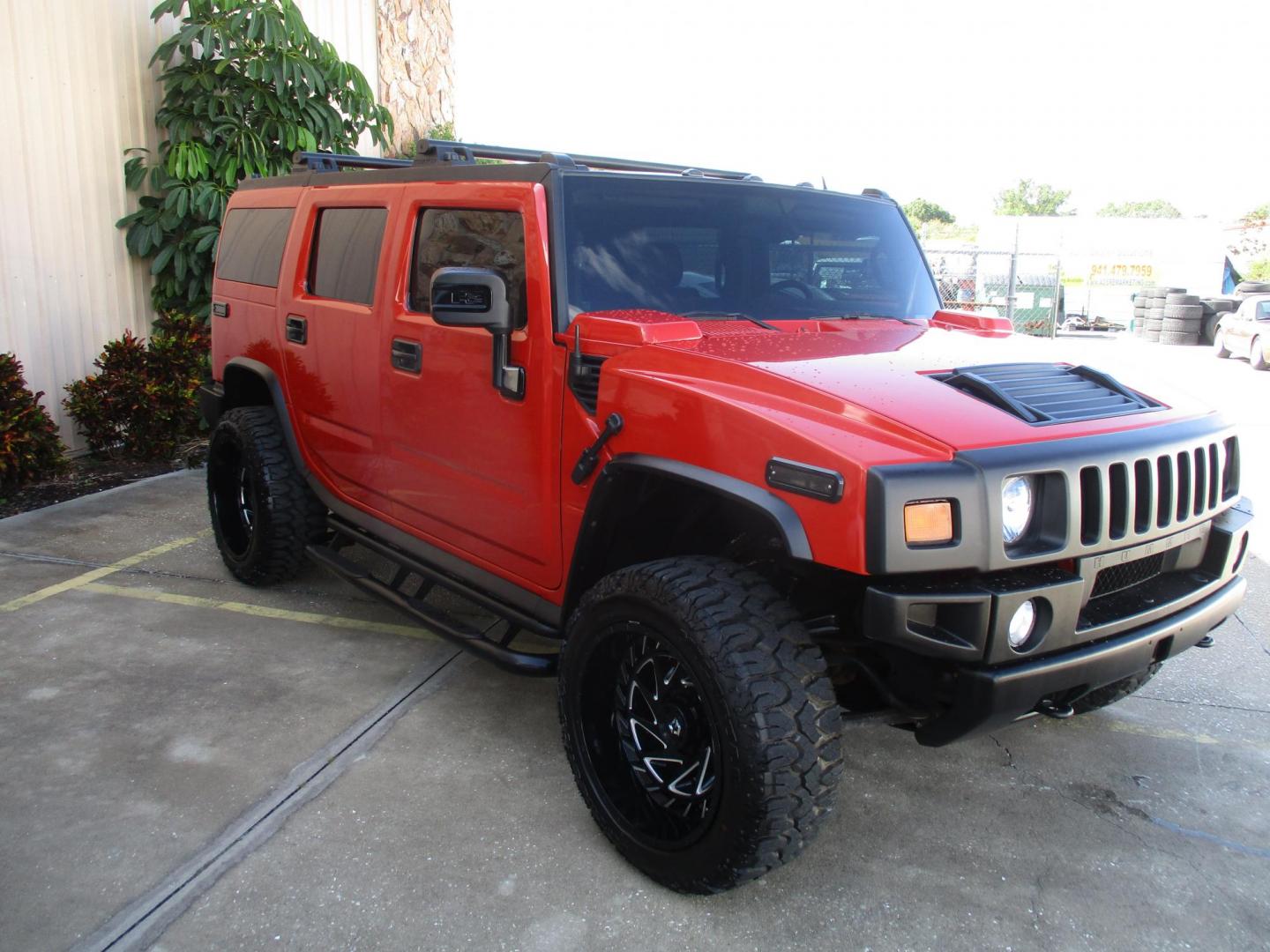 2008 Orange /Black HUMMER H2 Base (5GRGN23868H) with an 6.2L V8 OHV 16V engine, 6-Speed Automatic Overdrive transmission, located at 4724 53rd Ave East, Suite 1, Bradenton, FL, 34203, (941) 803-7117, 27.445360, -82.501678 - **AUTO DEALER SOLUTIONS**4724 53rd Ave ESuite 1Bradenton, Fl 34203941-803-71172008 HUMMER H2 5GRGN23868H10393454,256 MilesThis HUMMER H2 is literally new, over $50k spent on makeover, $10,000 paint job, all new leather throughout interior, new wheels and tires, all new trim accents. This H2 is an e - Photo#2