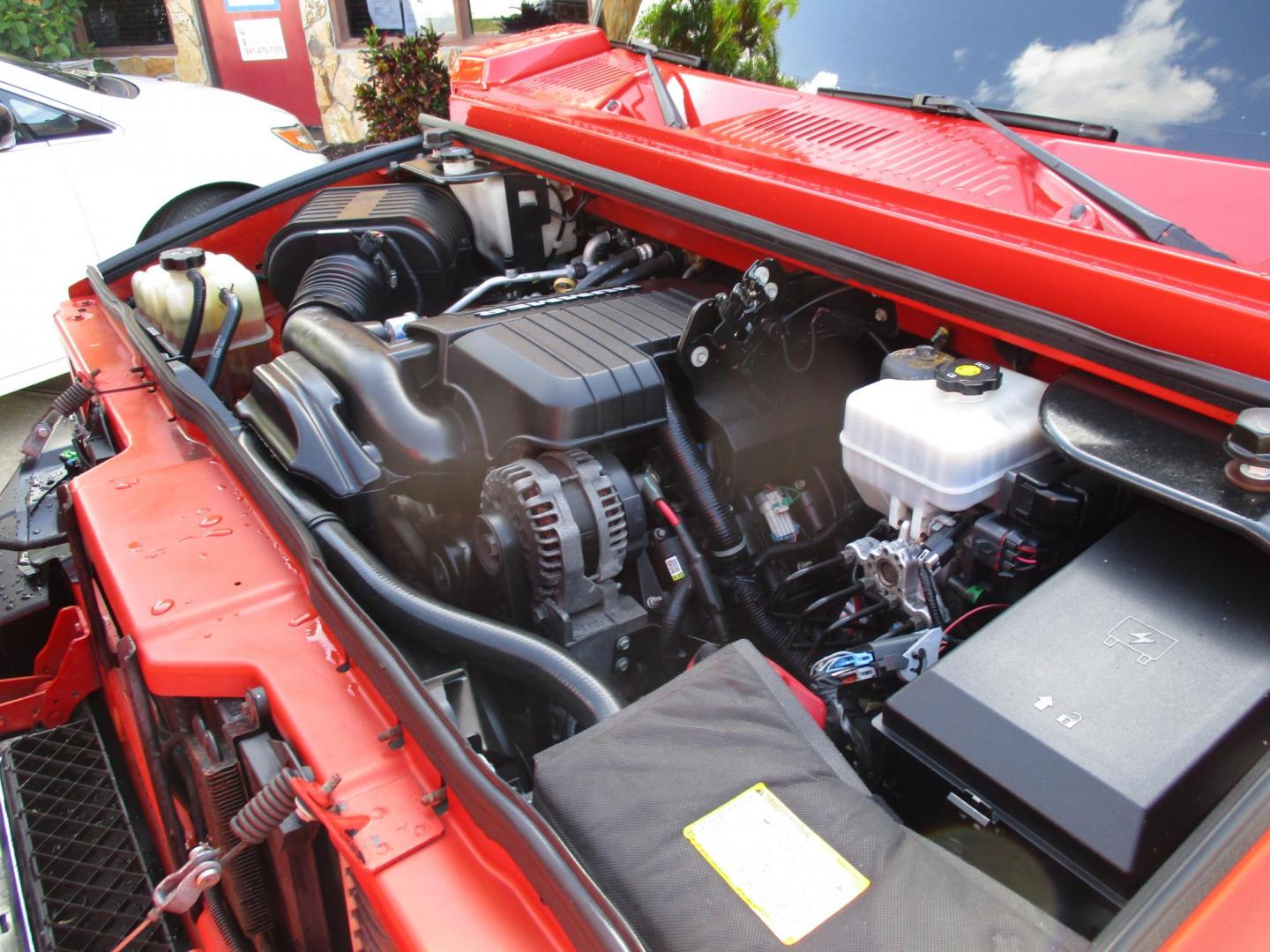 2008 Orange /Black HUMMER H2 Base (5GRGN23868H) with an 6.2L V8 OHV 16V engine, 6-Speed Automatic Overdrive transmission, located at 4724 53rd Ave East, Suite 1, Bradenton, FL, 34203, (941) 803-7117, 27.445360, -82.501678 - **AUTO DEALER SOLUTIONS**4724 53rd Ave ESuite 1Bradenton, Fl 34203941-803-71172008 HUMMER H2 5GRGN23868H10393454,256 MilesThis HUMMER H2 is literally new, over $50k spent on makeover, $10,000 paint job, all new leather throughout interior, new wheels and tires, all new trim accents. This H2 is an e - Photo#7